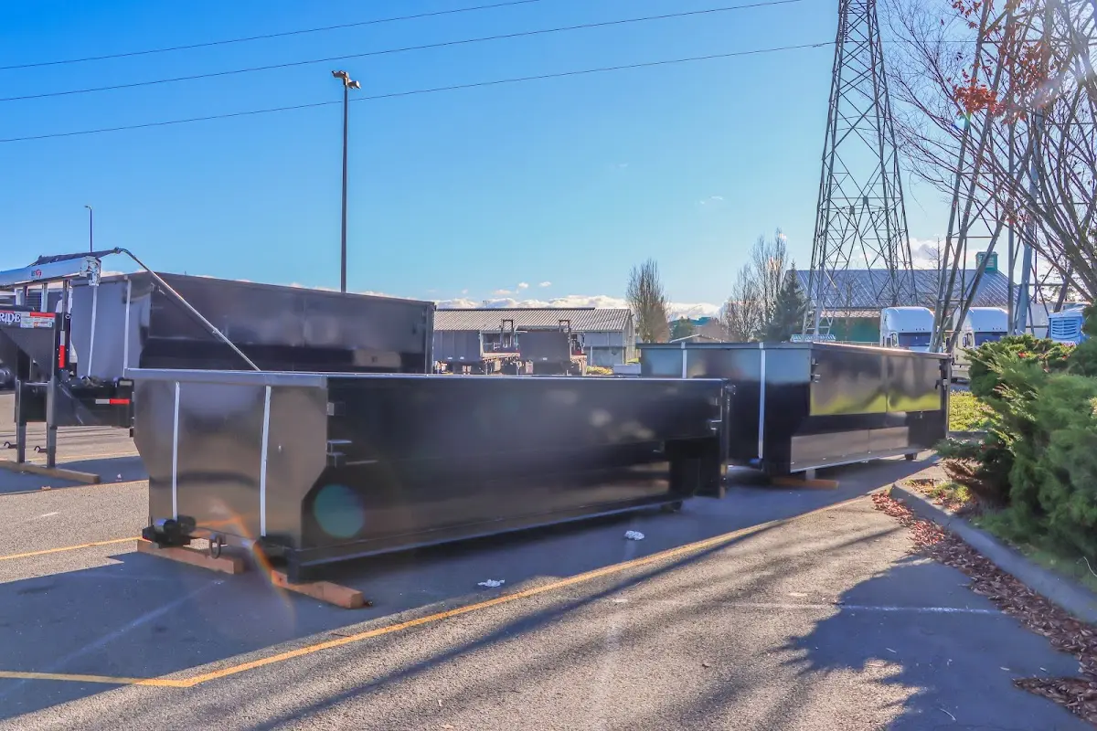 Roll-off dumpster ready for waste disposal at job site for 15 Yard Dumpster Rental in Prospect Park
